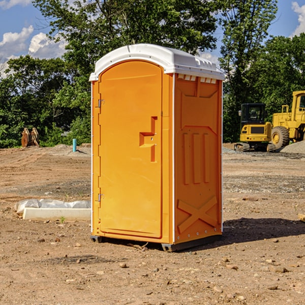 how often are the portable restrooms cleaned and serviced during a rental period in Hopeland